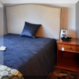 F62. Full size upholstered bed with nailhead trim. 53&rdquo;h 